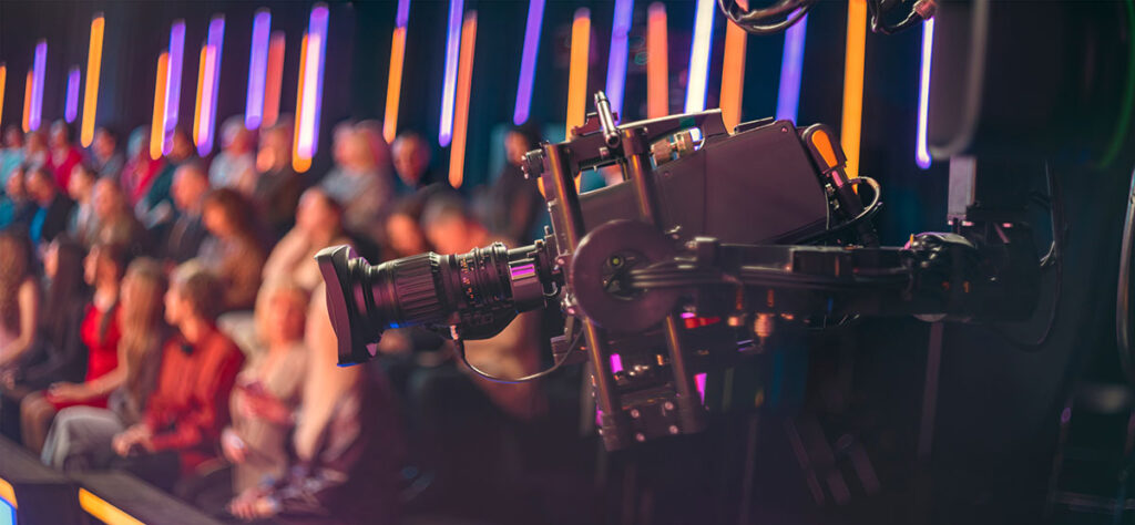 film camera in live audience television show